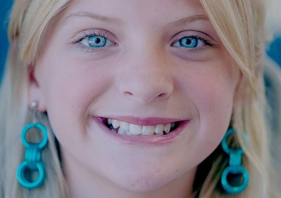Happy Smiling Girl with Earrings